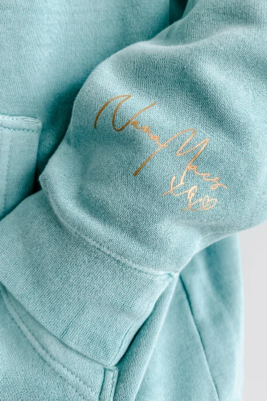 nanamacs-xoxo-vintage-wash-graphic-hoodie-mint-gold-text-sleeve-print-on-demand