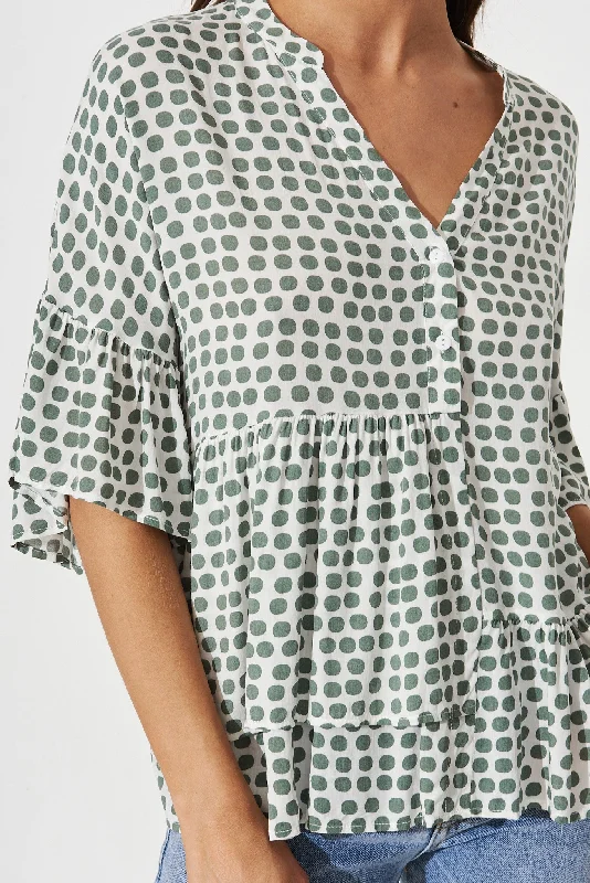 relia-top-in-white-with-green-polka-dot